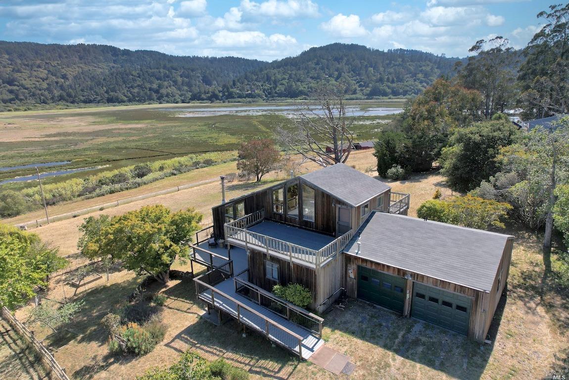 358 Mesa Road Point Reyes Station, CA 94956 - Photo 1 of 1 a view of a terrace with a lake view