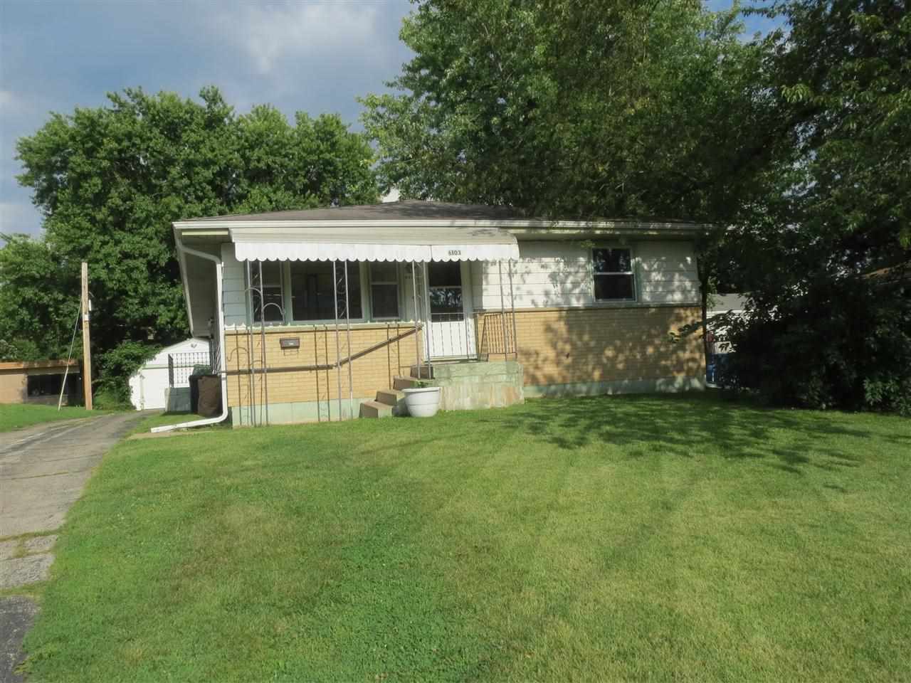 6103 Park Ridge Road Loves Park, IL 61111 - Photo 1 of 22 a view of a house with backyard and garden