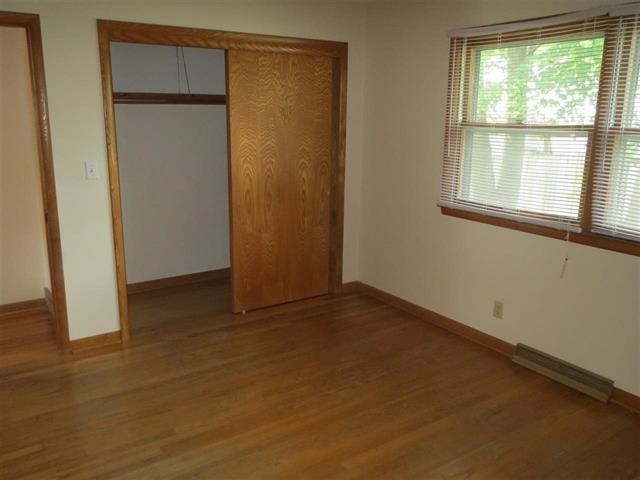 6103 Park Ridge Road Loves Park, IL 61111 - Photo 6 of 22 an empty room with a window