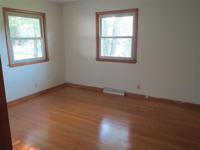 6103 Park Ridge Road Loves Park, IL 61111 - Photo 7 of 22 an empty room with a window