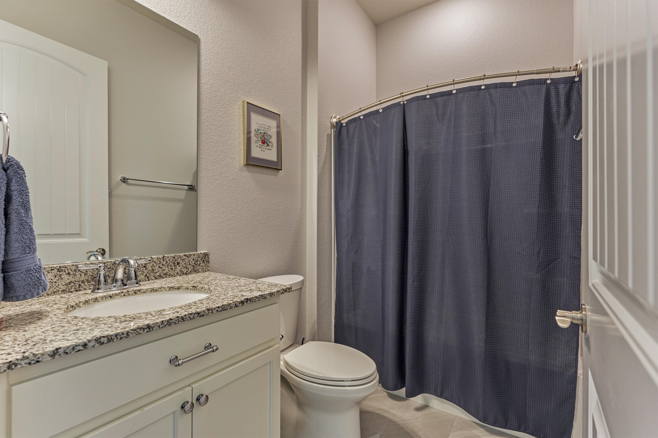 108 Wild Wick Way Spring, TX 77382 - Photo 31 of 44 The Secondary Full Bath Is Conveniently Situated By The Secondary Bedrooms And Features A Repainted Vanity And Granite Countertop.
