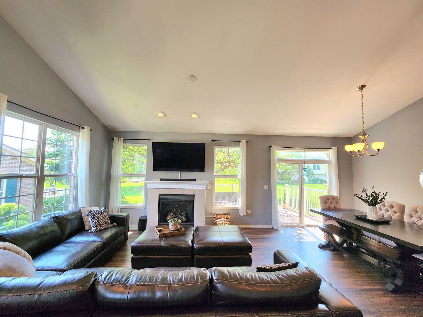 982 Oak Ridge Boulevard Elgin, IL 60120 - Photo 4 of 27 a living room with furniture fireplace and a large window