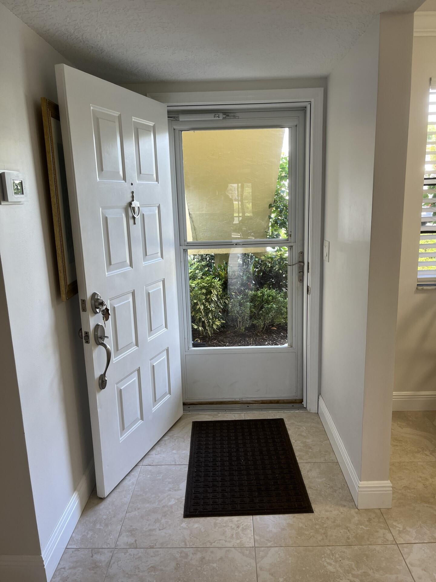 2041 Keystone Drive, Unit B Jupiter, FL 33458 - Photo 16 of 17 Front Door