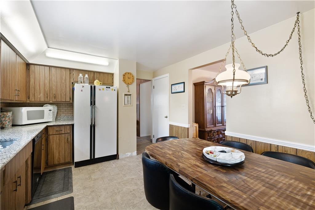 43 Jaycee Drive Pittsburgh, PA 15243 - Photo 12 of 38 a bathroom with a granite countertop sink and a mirror