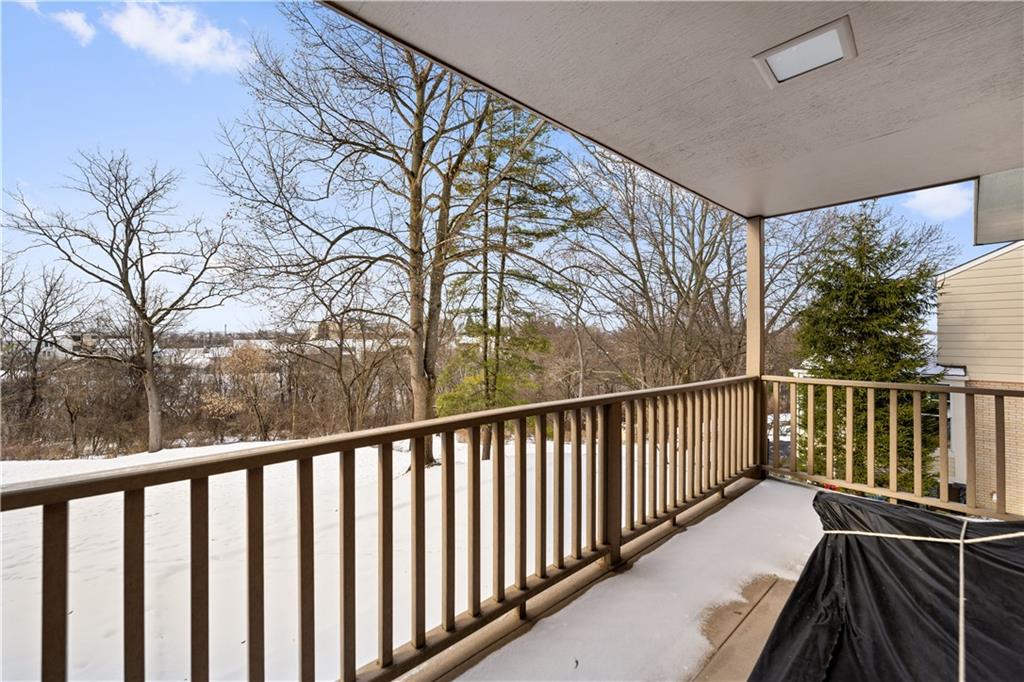 43 Jaycee Drive Pittsburgh, PA 15243 - Photo 17 of 38 a view of balcony with wooden floor and fence