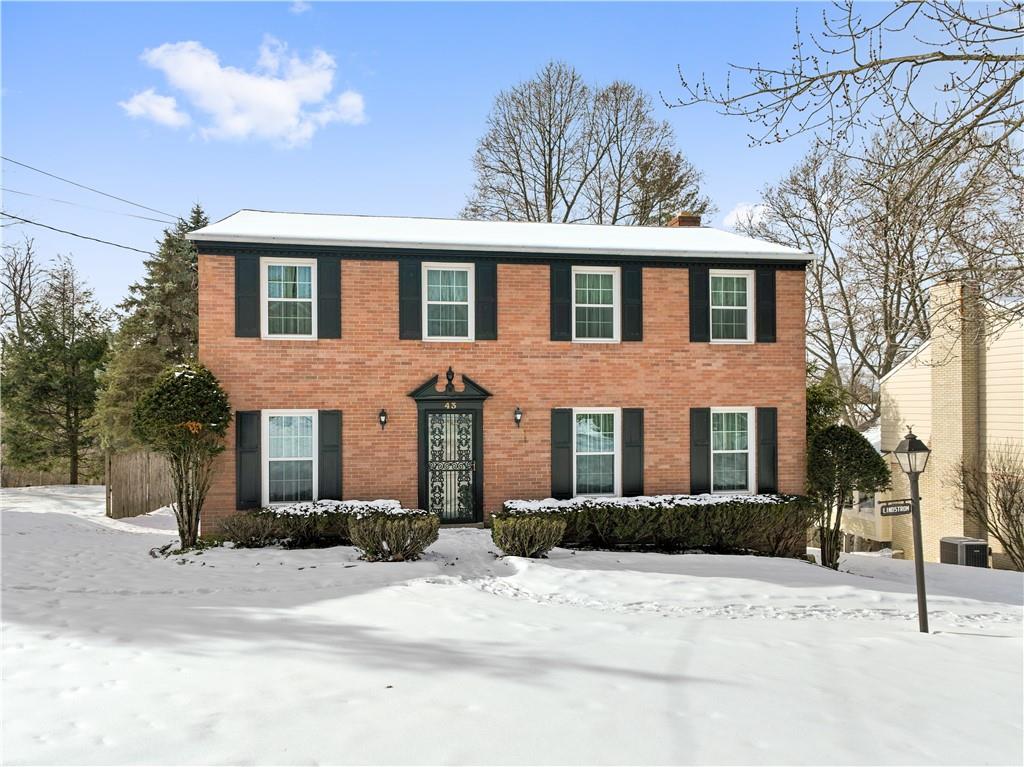 43 Jaycee Drive Pittsburgh, PA 15243 - Photo 2 of 38 a front view of a house with a yard and garage