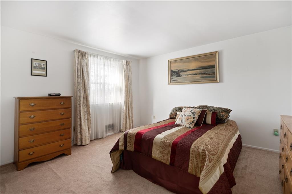 43 Jaycee Drive Pittsburgh, PA 15243 - Photo 22 of 38 a bedroom with a bed and a window