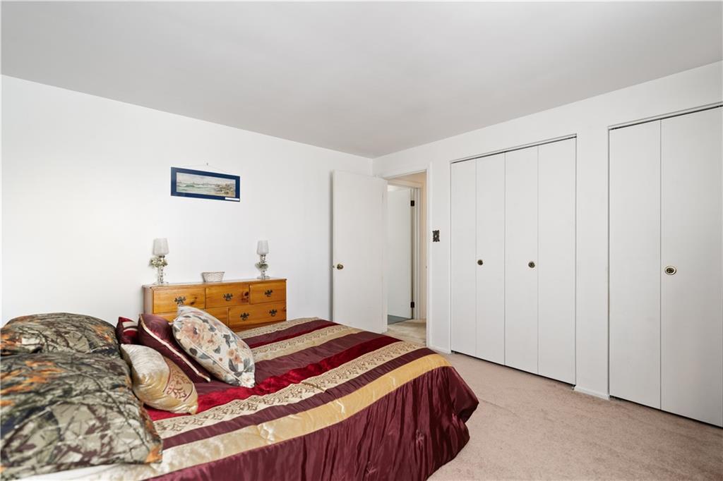 43 Jaycee Drive Pittsburgh, PA 15243 - Photo 23 of 38 a bedroom with a bed and a cabinets