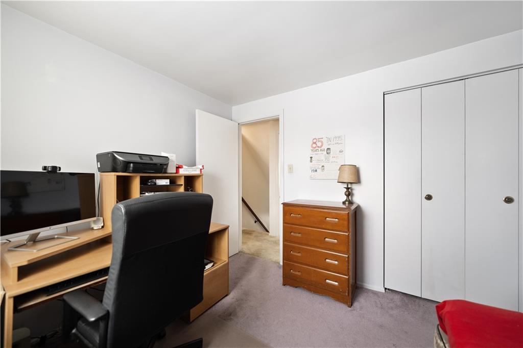 43 Jaycee Drive Pittsburgh, PA 15243 - Photo 26 of 38 a view of a livingroom with furniture and a flat screen tv