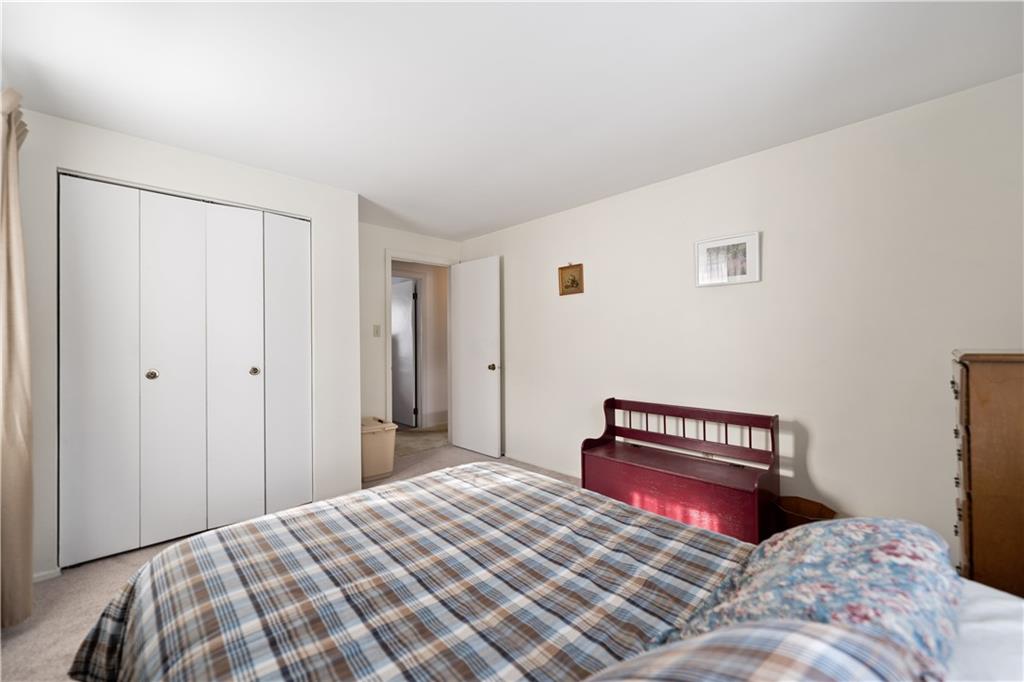 43 Jaycee Drive Pittsburgh, PA 15243 - Photo 28 of 38 a bedroom with a bed and a cabinets