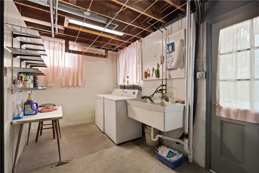 43 Jaycee Drive Pittsburgh, PA 15243 - Photo 32 of 38 a view of storage and utility room with racks a book shelf