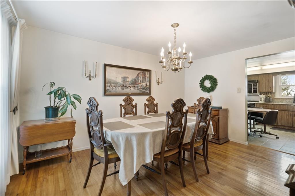 43 Jaycee Drive Pittsburgh, PA 15243 - Photo 6 of 38 a view of a dining room with furniture and wooden floor