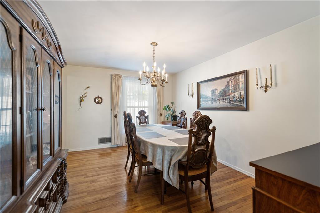 43 Jaycee Drive Pittsburgh, PA 15243 - Photo 8 of 38 a view of a dining room with furniture window and wooden floor