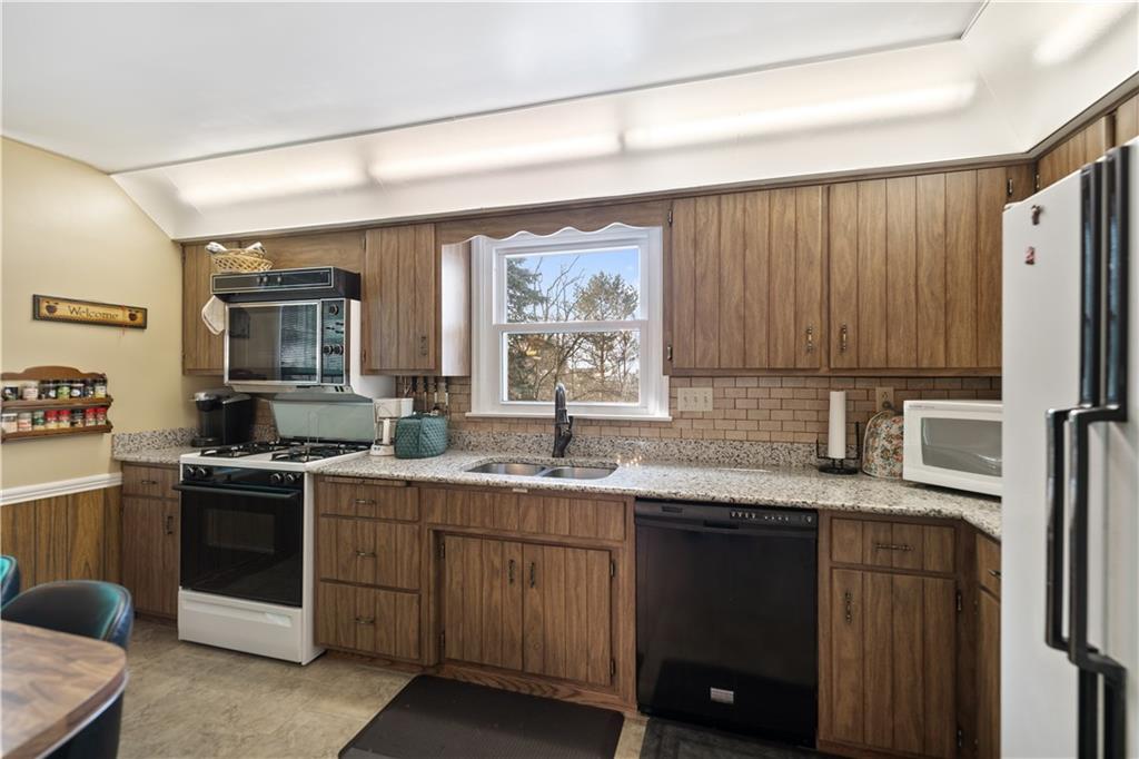 43 Jaycee Drive Pittsburgh, PA 15243 - Photo 10 of 38 a kitchen with a sink and cabinets