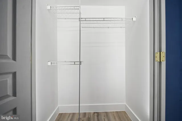 wooden floor and window in an empty room