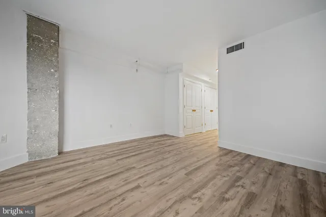 a view of a room with racks on the wall