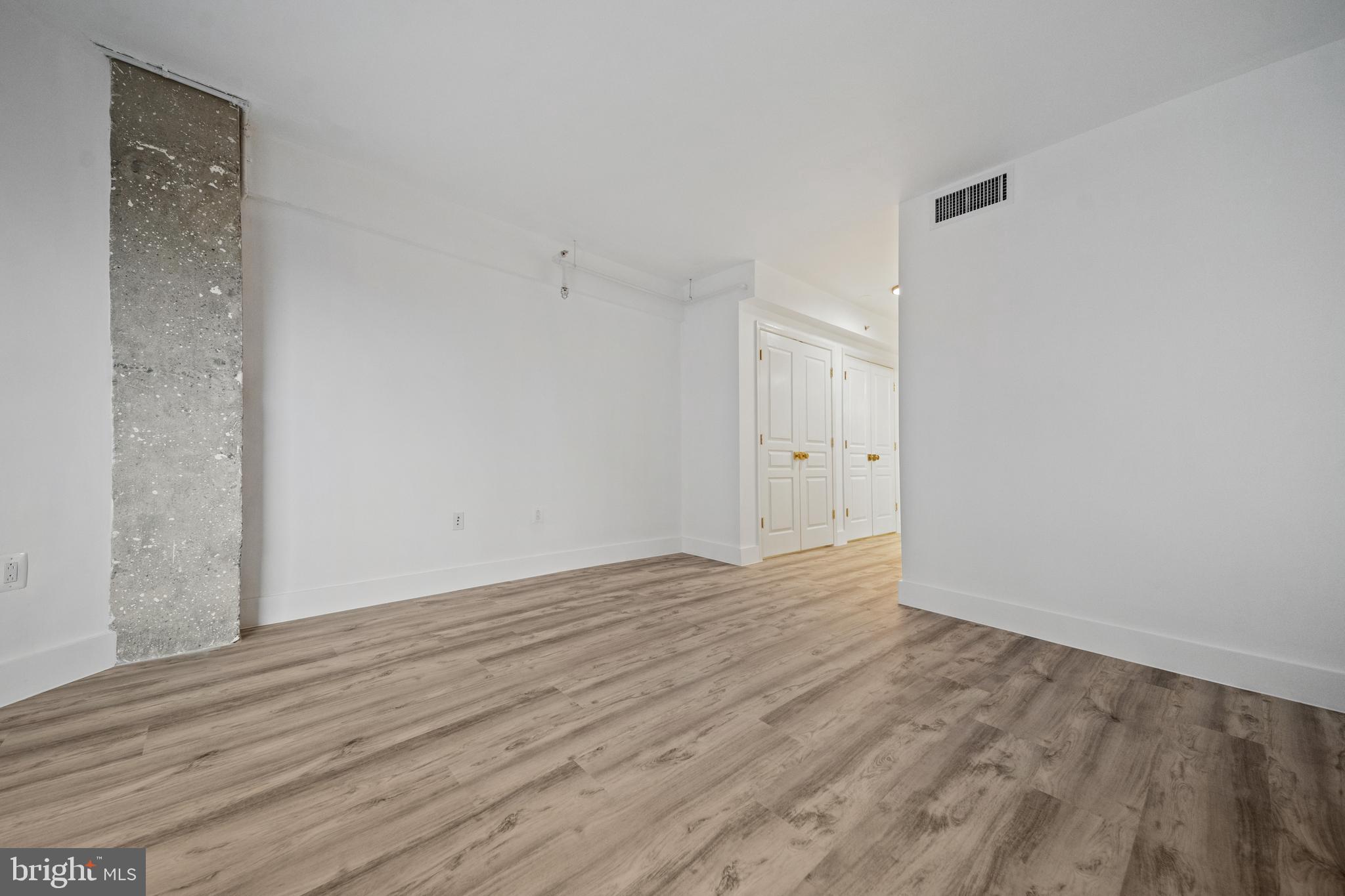 616 E Street Northwest, Unit 856 Washington, DC 20004 - Photo 27 of 84 wooden floor in an empty room