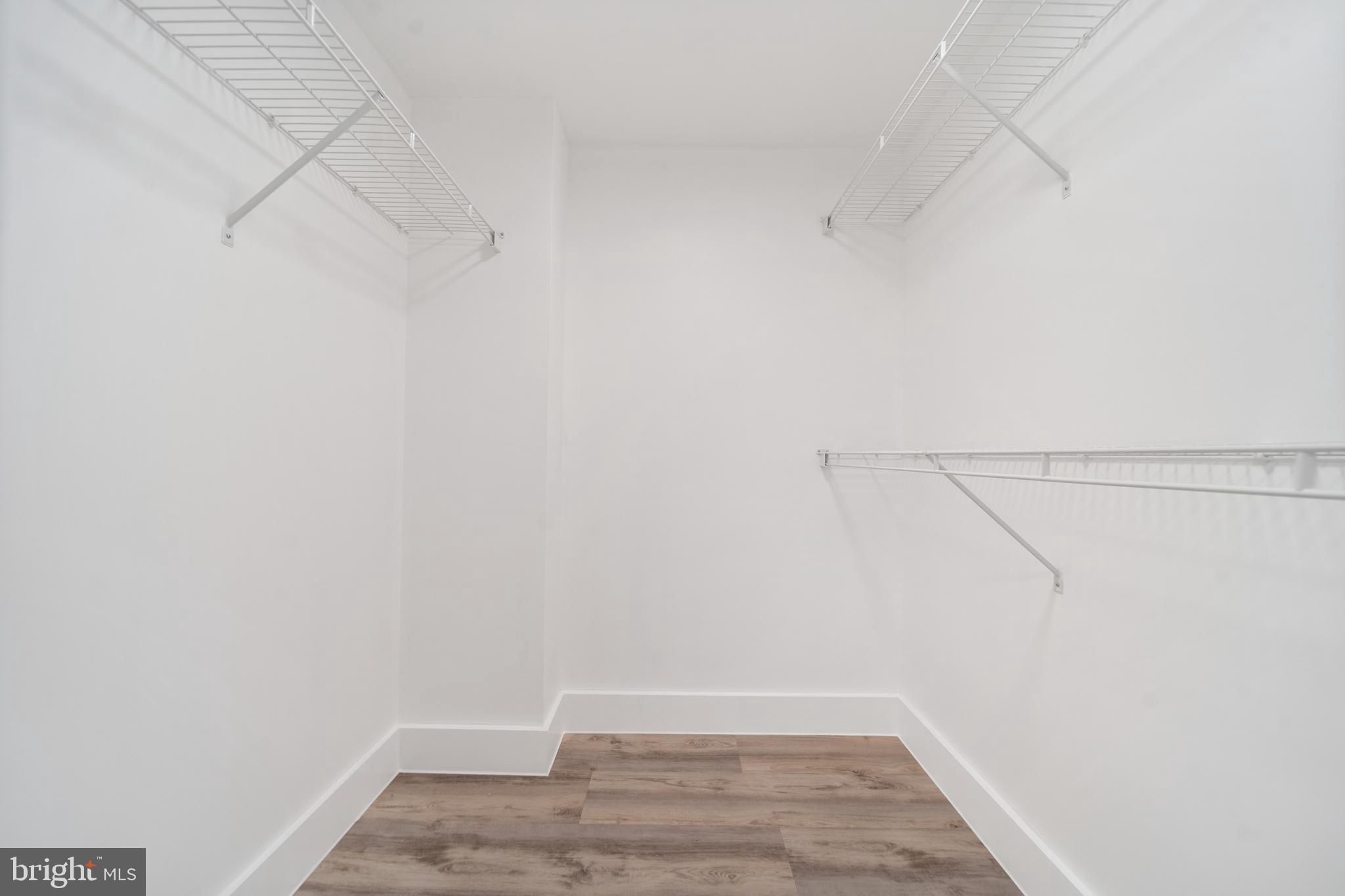 616 E Street Northwest, Unit 856 Washington, DC 20004 - Photo 31 of 84 a view of a room with racks on the wall