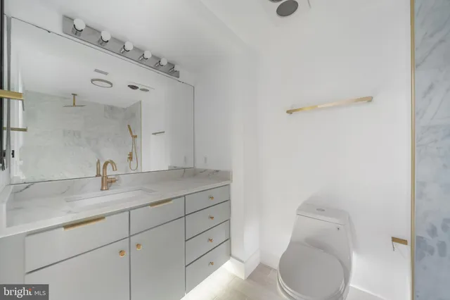 a lobby with a table and chairs