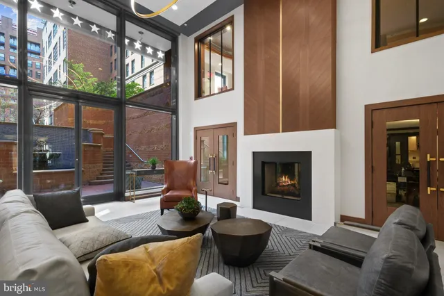 a living room with furniture and a table