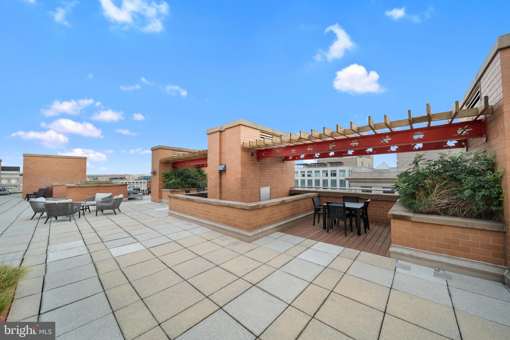 616 E Street Northwest, Unit 856 Washington, DC 20004 - Photo 58 of 84 a view of a terrace with sitting area