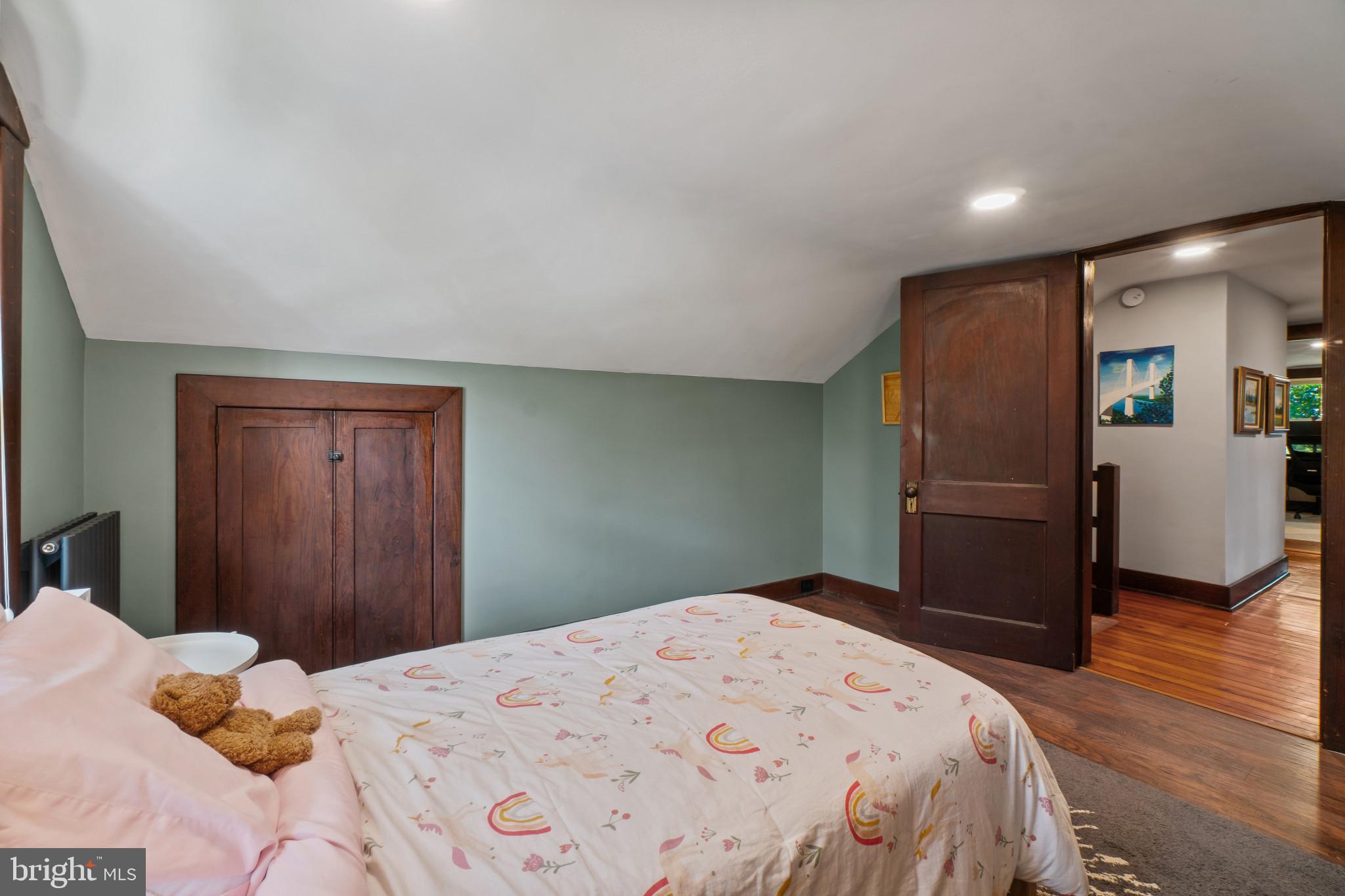 2900 Rueckert Avenue Baltimore, MD 21214 - Photo 25 of 40 a bedroom with a bed and a dresser