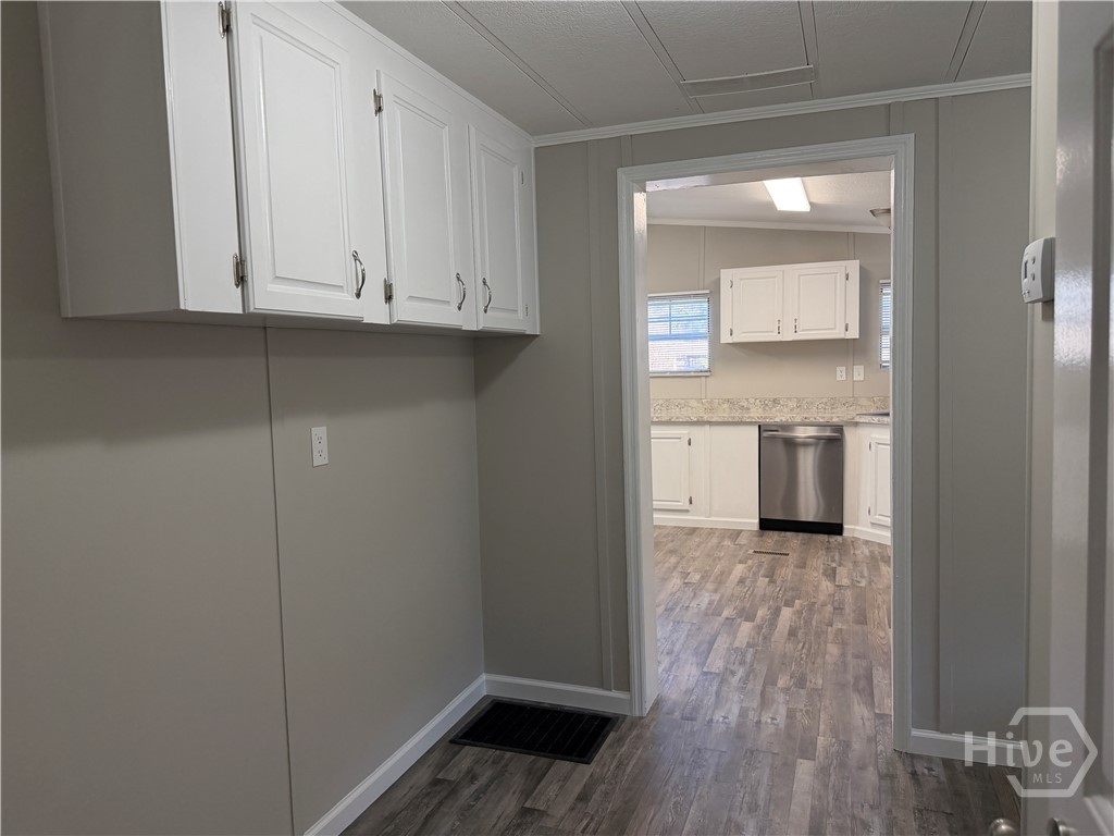 150 Maple Drive Ellabell, GA 31308 - Photo 24 of 42 Common Office, Utility Area Opening To Kitchen