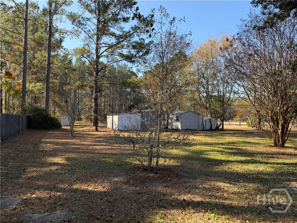 150 Maple Drive Ellabell, GA 31308 - Photo 42 of 42 Back Yard & 2 Utility Storage / Workshop Buildings