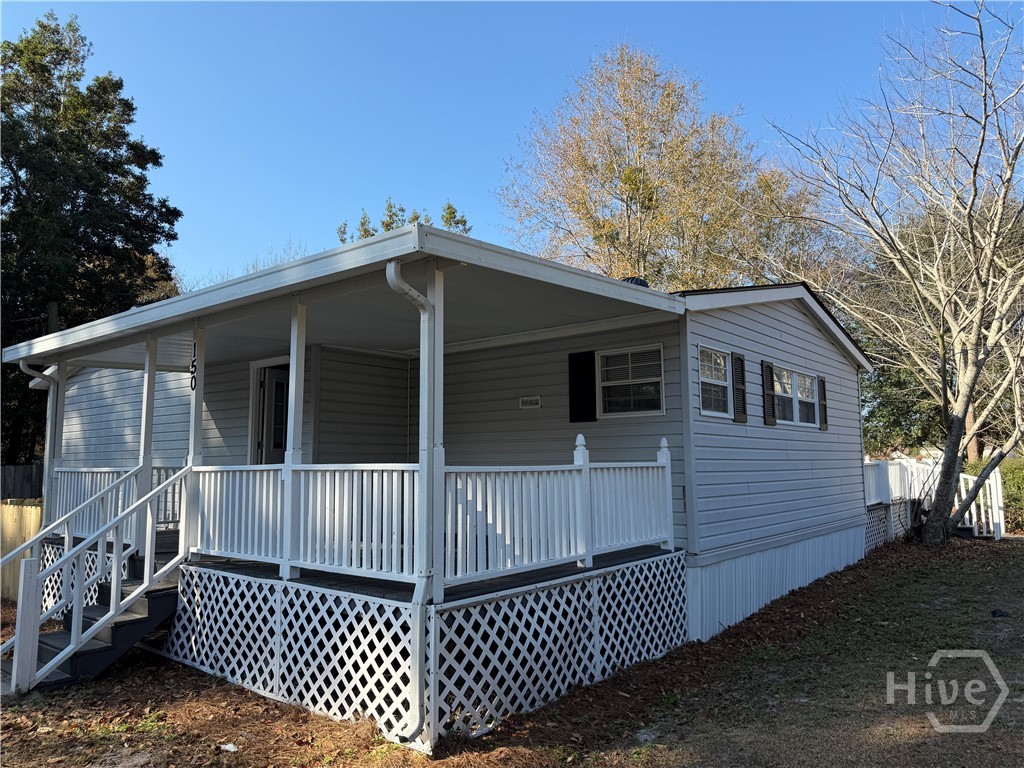 150 Maple Drive Ellabell, GA 31308 - Photo 6 of 42 Side Entry Patio Deck