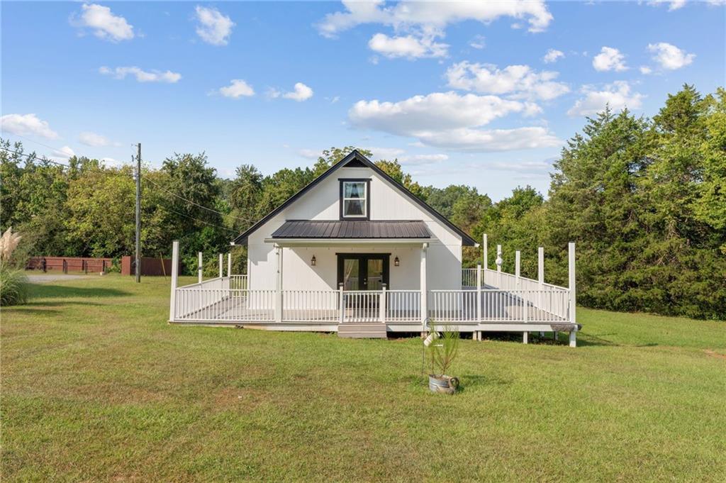 766 Antioch Road Cedartown, GA 30125 - Photo 1 of 1 a front view of a house with a yard