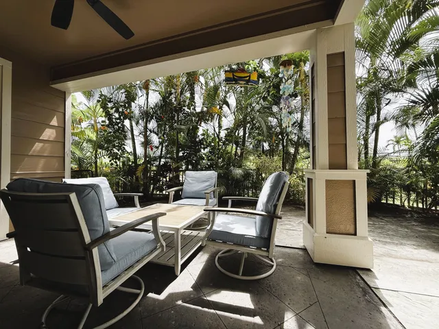 a view of living room with patio furniture