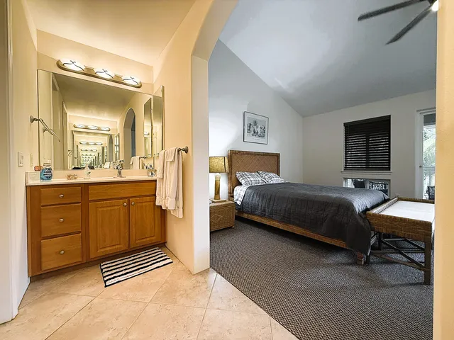 a bedroom with a bed and furniture