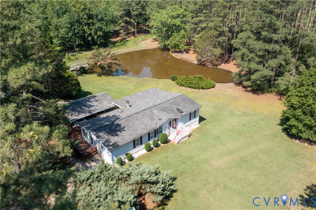 967 Ampthill Road Cartersville, VA 23027 - Photo 4 of 43 Expansive property featuring a pond, mature trees,