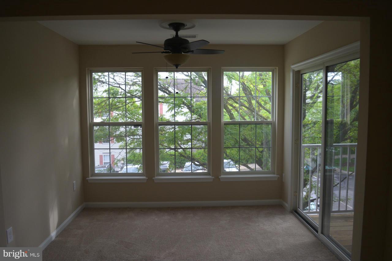 10101 Ridge Manor Terrace, Unit 2000H Damascus, MD 20872 - Photo 8 of 17 Sunroom