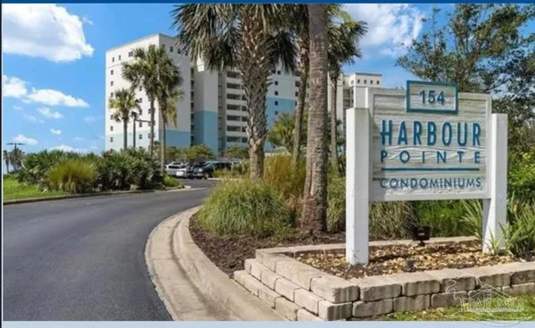 a view of a balcony with furniture