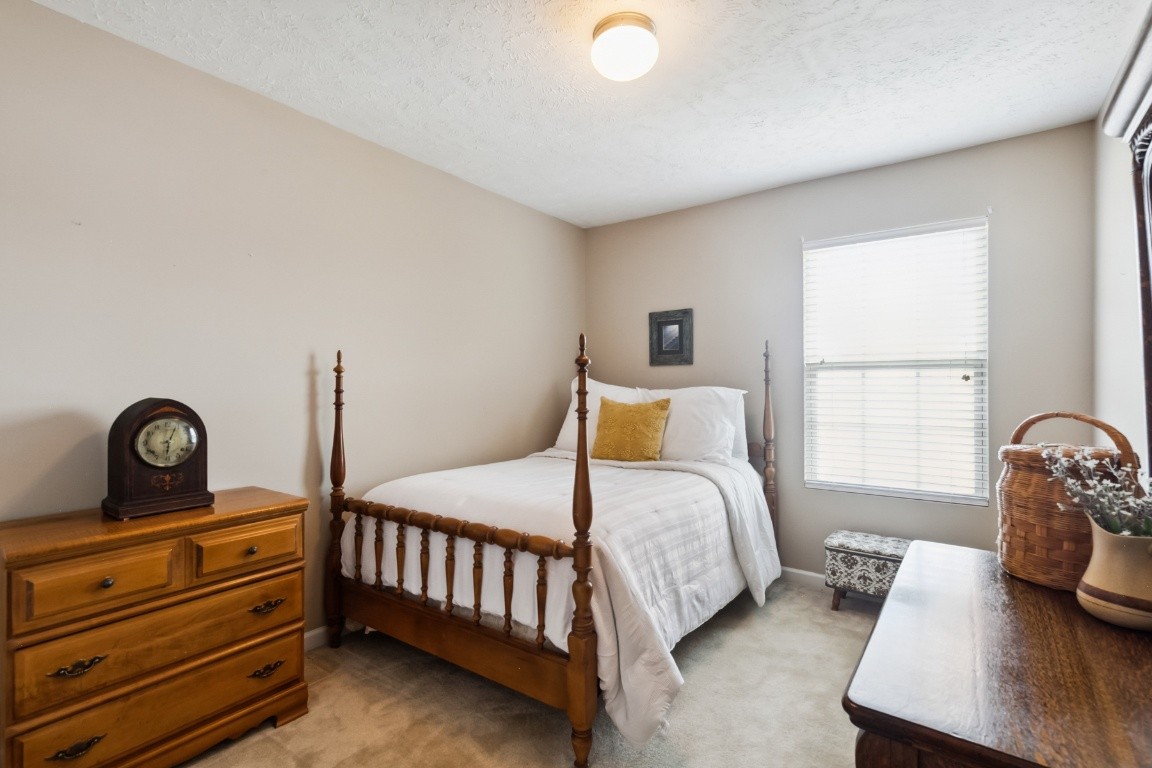 8338 Rossi Road Brentwood, TN 37027 - Photo 13 of 16 a bedroom with bed and a window