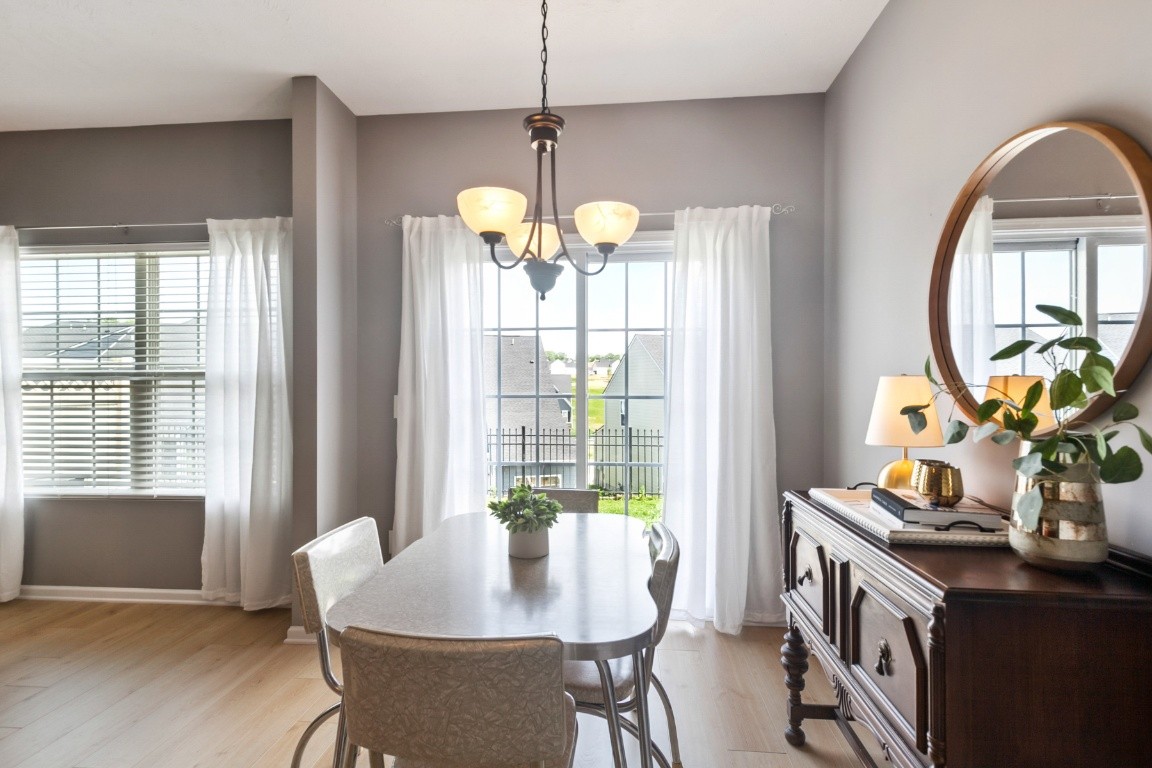 8338 Rossi Road Brentwood, TN 37027 - Photo 8 of 16 a dining room with furniture and window