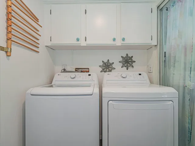 a living room with lots of furniture and a flat screen tv