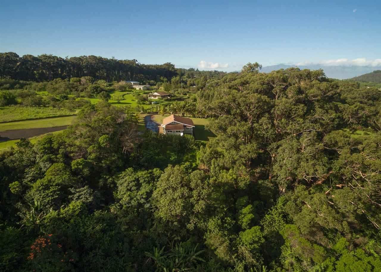 53 Awalau Road Haiku, HI 96708 - Photo 27 of 30 a view of a lake with a mountain in the background