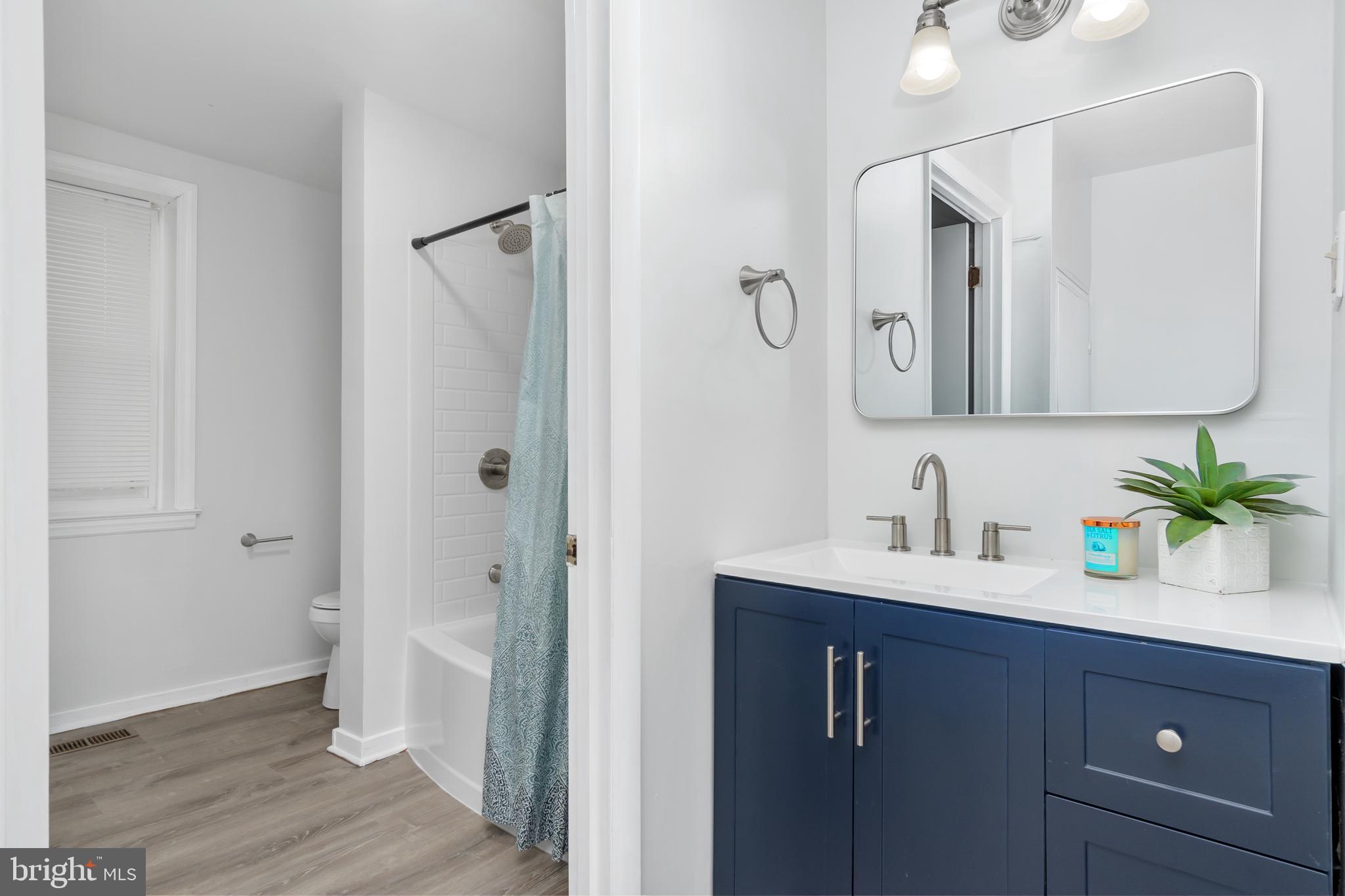 2730 Marker Road Middletown, MD 21769 - Photo 13 of 73 a bathroom with a sink and a mirror