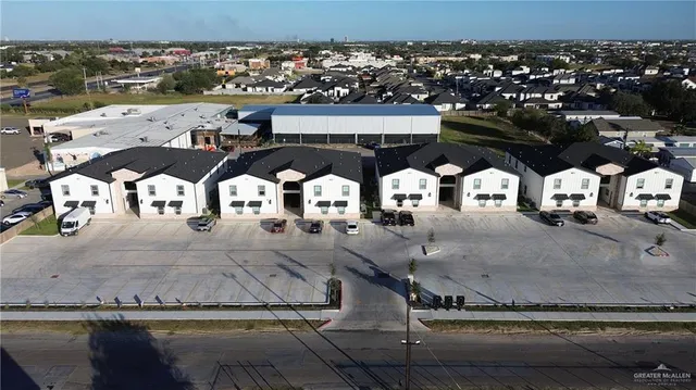 a view of building with an outdoor seating