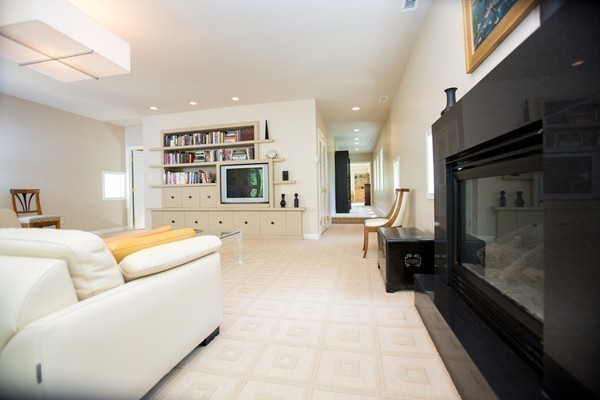 474 Glen Road Weston, MA 02493 - Photo 21 of 30 a living room with furniture and a fireplace