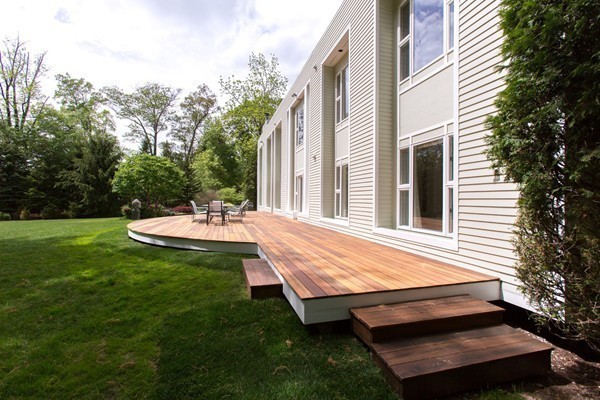 474 Glen Road Weston, MA 02493 - Photo 24 of 30 a view of a chairs and table in backyard of the house