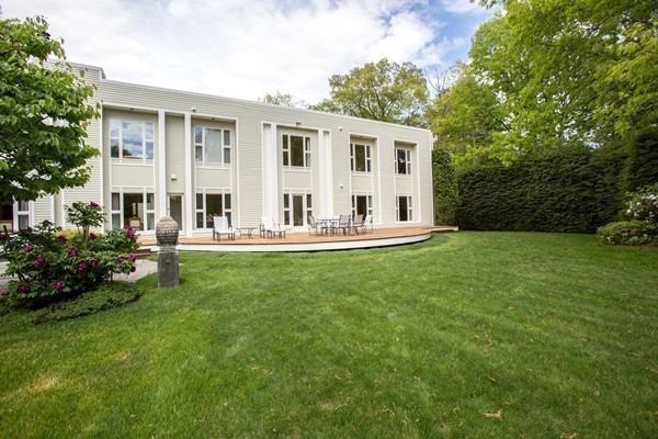 474 Glen Road Weston, MA 02493 - Photo 25 of 30 a front view of house with garden and trees