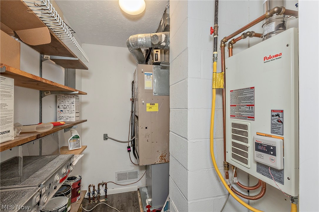 6635 Liberty Road Solon, OH 44139 - Photo 33 of 44 Equipment room, including tankless Hot Water Tank