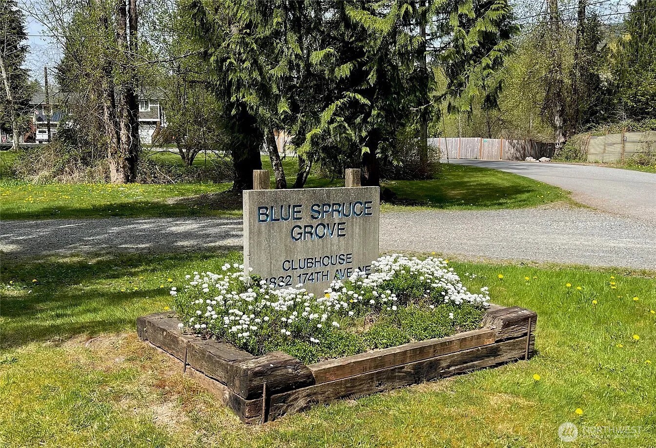 12114 Jordan Road Arlington, WA 98223 - Photo 12 of 19 a wooden bench sitting in the middle of a park