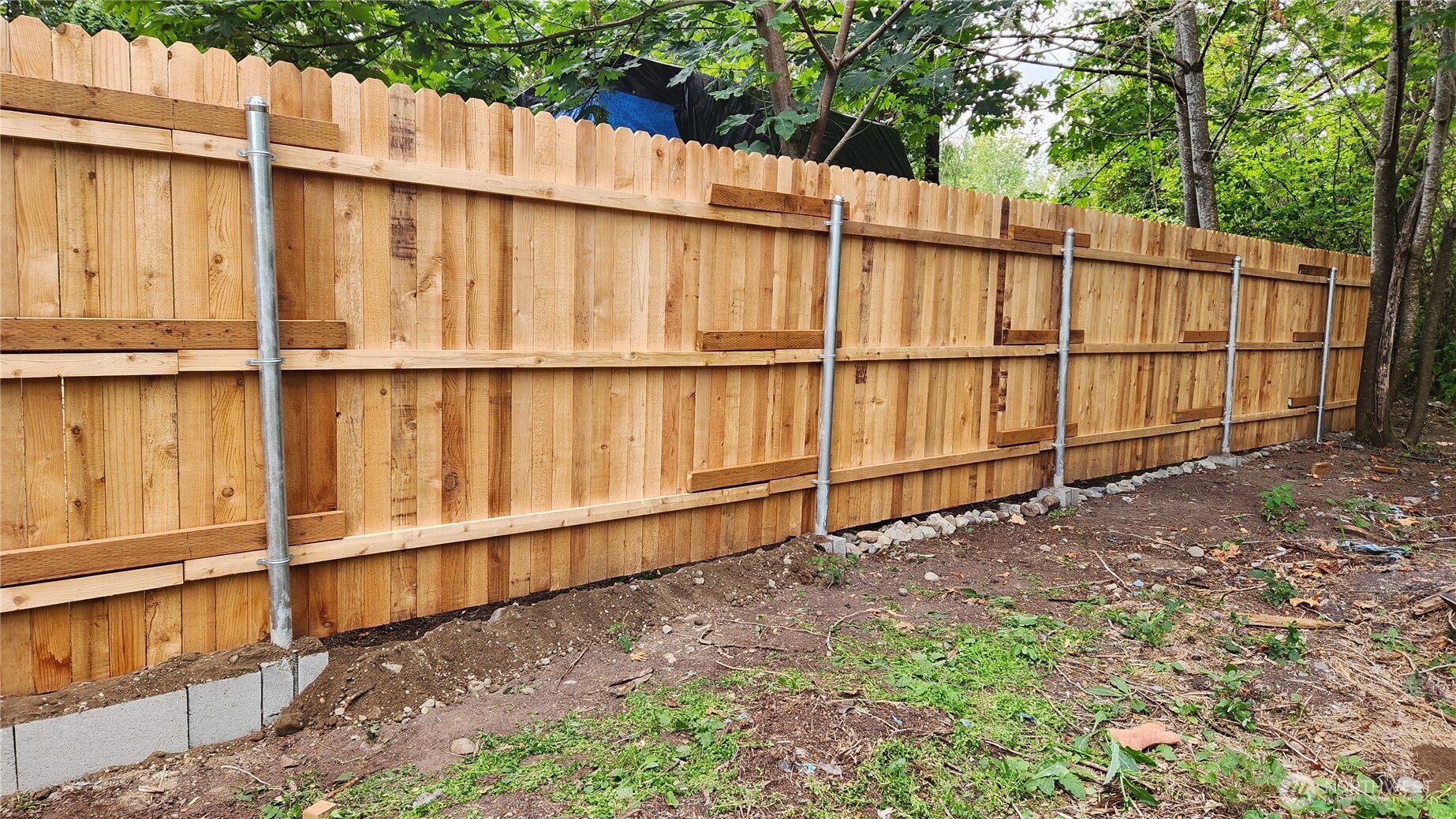 12114 Jordan Road Arlington, WA 98223 - Photo 5 of 19 a view of a backyard with a fence
