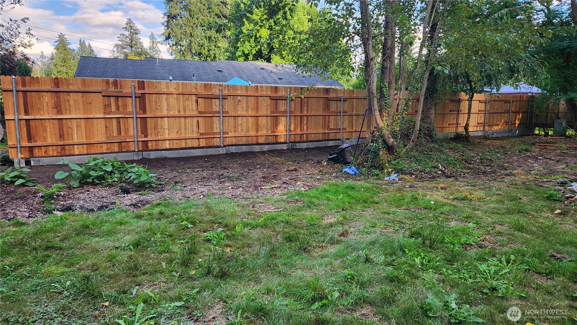 12114 Jordan Road Arlington, WA 98223 - Photo 6 of 19 a backyard of a house with lots of green space