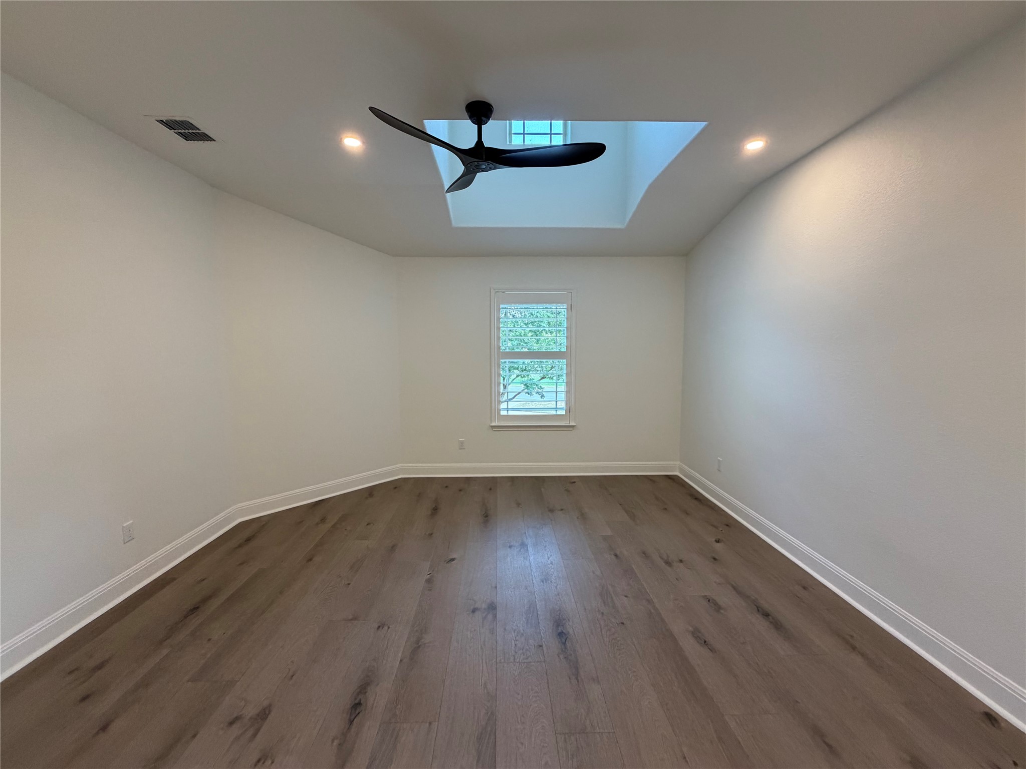 7801 Aria Loop Austin, TX 78736 - Photo 33 of 40 Secondary bedroom 4 includes a walk in closet and niche with a skylight
