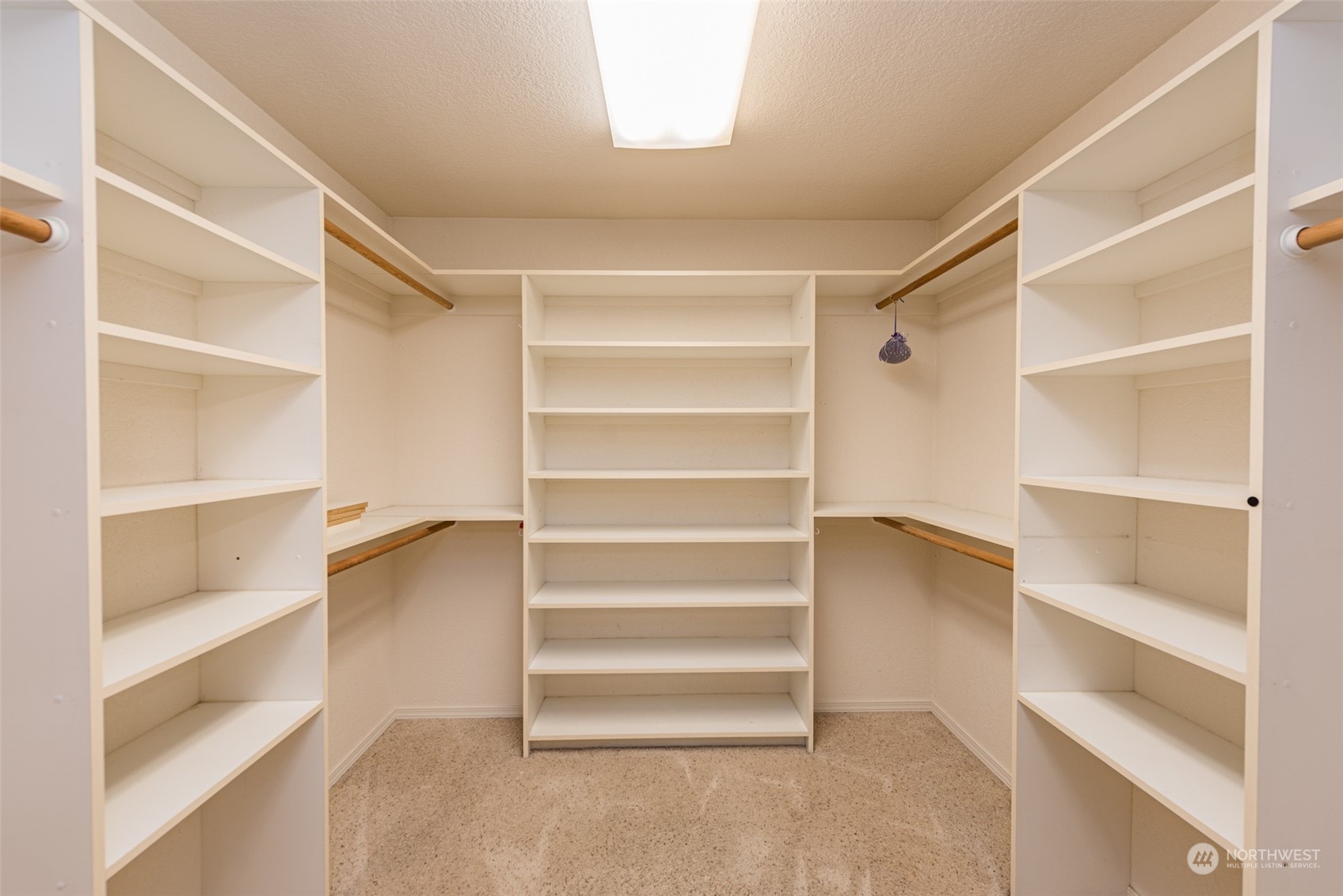 653 Brigadoon Boulevard Sequim, WA 98382 - Photo 22 of 40 a view of walk in closet with empty racks